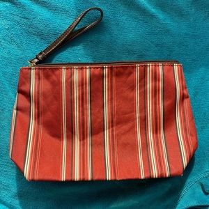 Esteer Lauder Wristlet Handbag in Brick Color